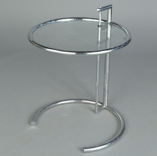 Eileen Gray Glass and Chrome Table: Circular glass top. Adjustable height, maximum 39 inches, diameter 20 inches.