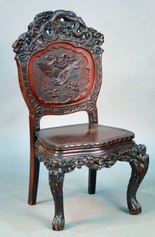 Asian Carved Hardwood Hall Chair: Dragon, bird and cloud decoration. Height 40 inches, width 21 inches, depth 18 inches. Provenance: From a Gramercy Park estate.