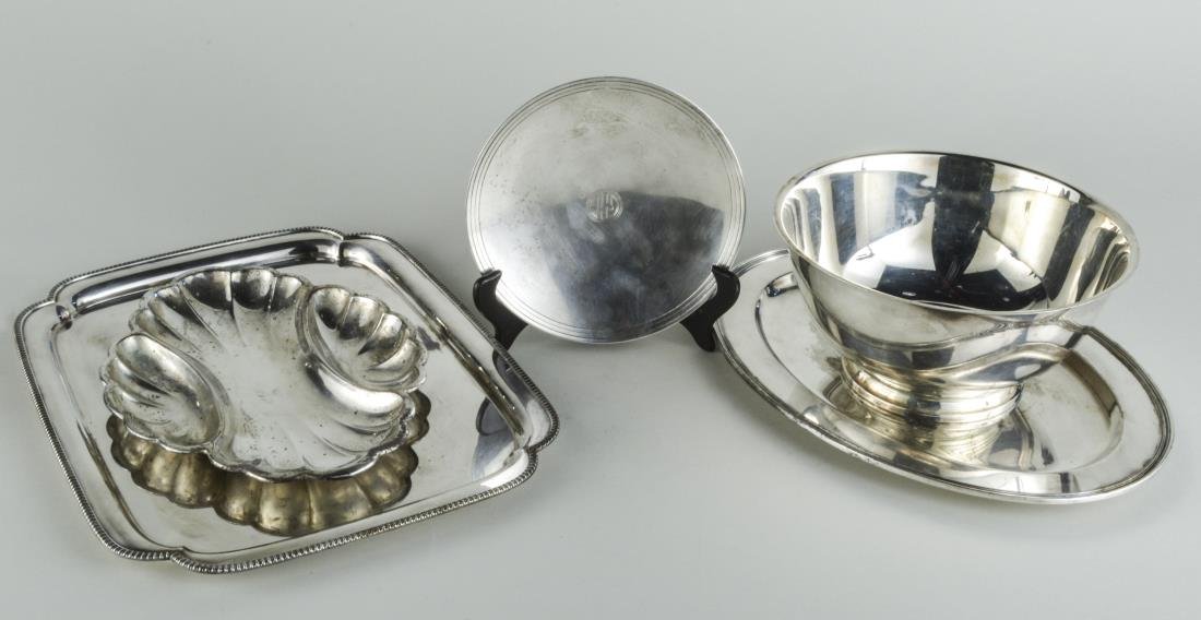 Tiffany Sterling Silver Tray: Circular tray with ring foot, monogrammed; together with a group of silver plated articles including three trays and a Revere style bowl, etc. Tiffany tray, diameter 8 1/8 inches, 10 ounces.