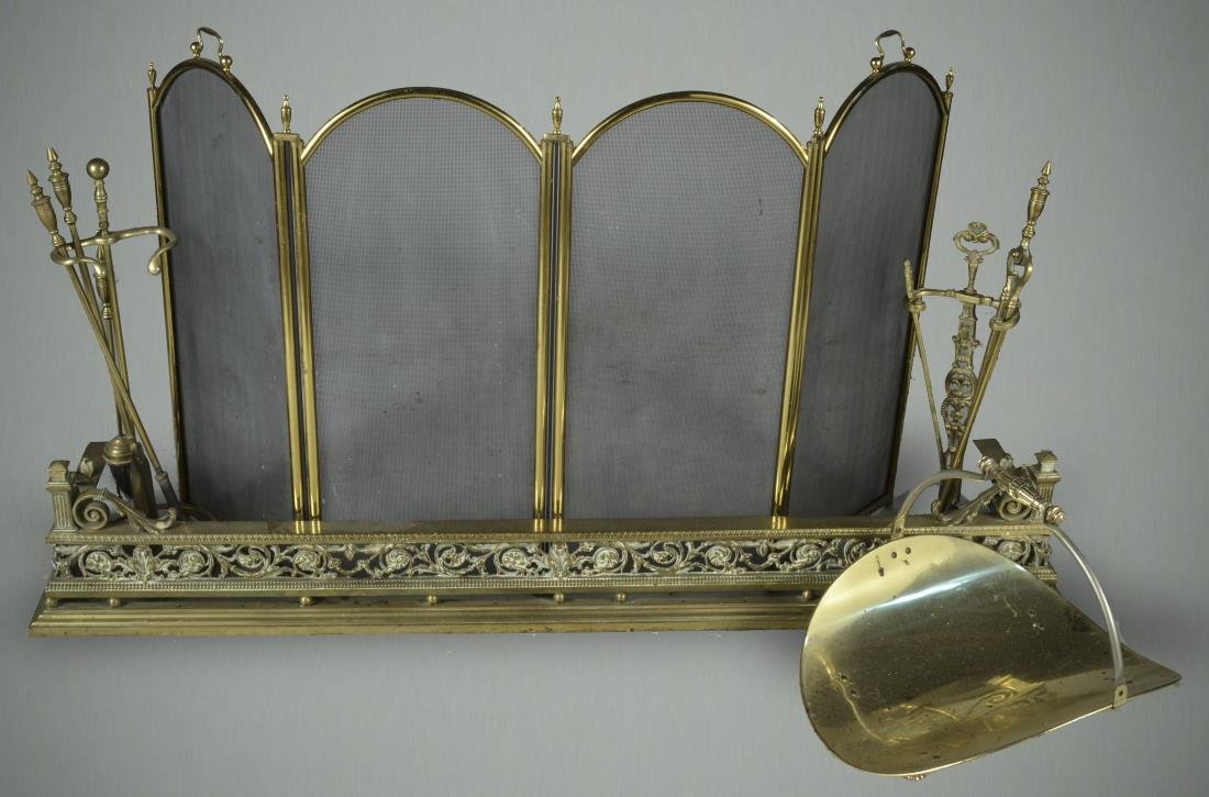Group of Brass Fireplace Equipment: Comprising a folding screen, a fender, two sets of tools and a coal bin. Fender, height 11 inches, length 62 inches, depth 13 1/2 inches, screen, height 34 inches. Provenance: From a Riverdale Estate