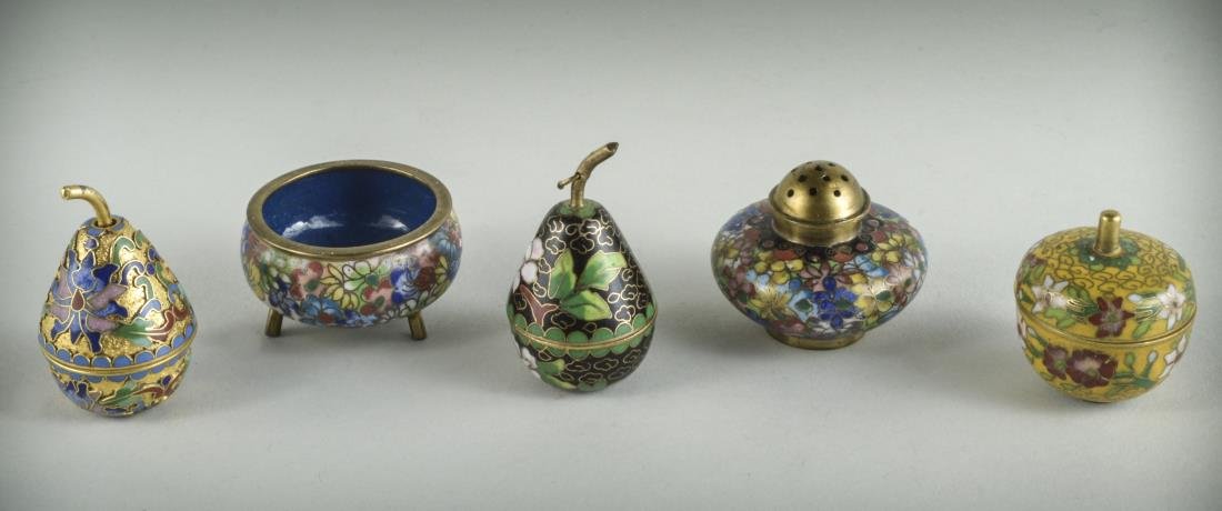 Five Miniature Cloisonne Table Decorations: Two pear shaped boxes, a circular box and a salt cellar and shaker set, all with floral decoration. Shaker, height 1 1/2 inches.