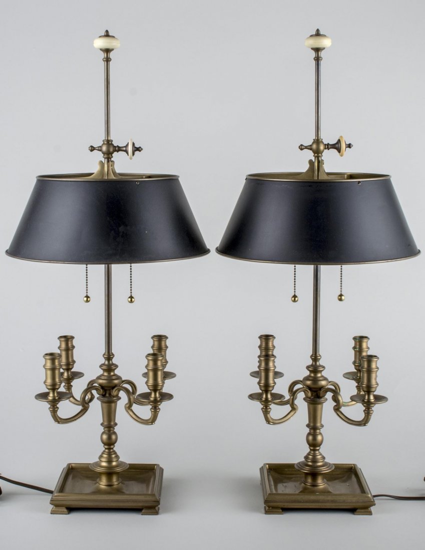 Pair of Bouillotte Lamps: Brass lamps with black tole shades. Overall height 32 inches.