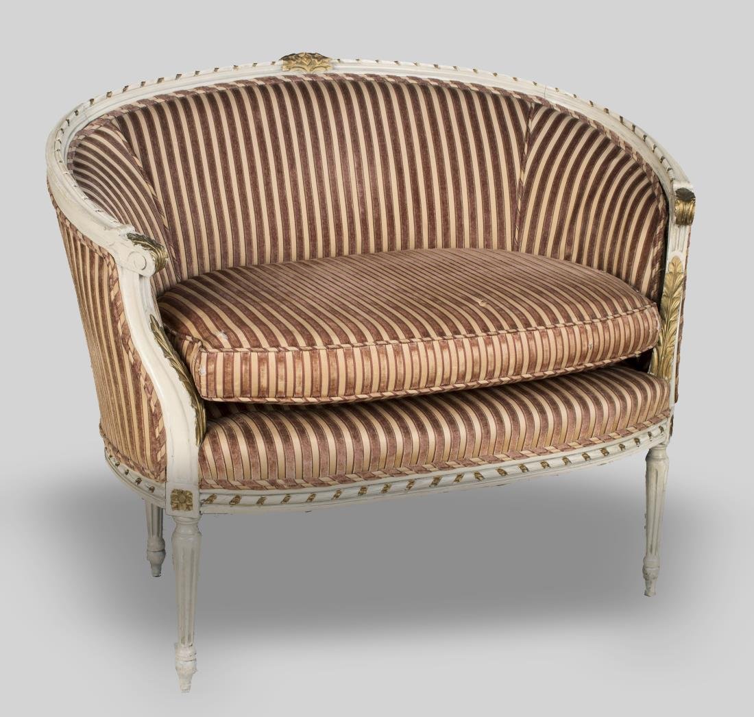 Louis XVI Style Painted Canape a Corbeille: Cream painted and parcel gilt decoration. Height 33 1/4 inches, width 40 inches, depth 26 1/2 inches.