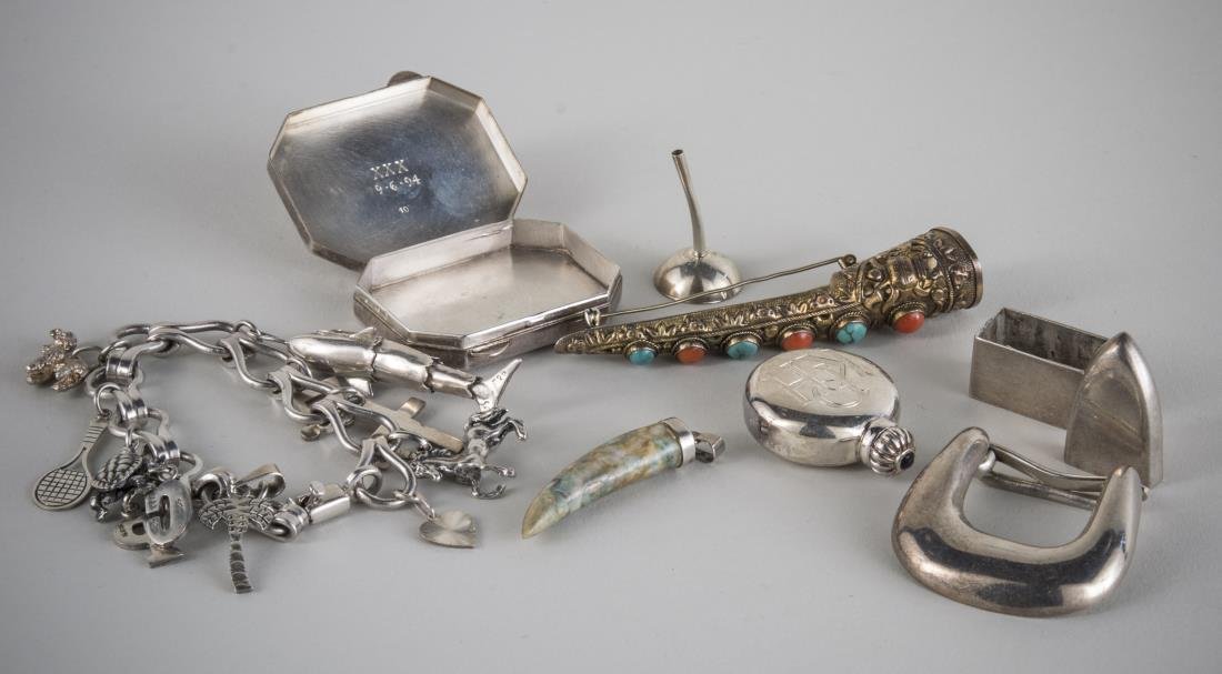 Group of Silver Jewelry: Including a Tiffany & Co. sterling silver purse perfume bottle and funnel, Mexican charm bracelet, box, belt buckle, etc. Total 6 ounces.
