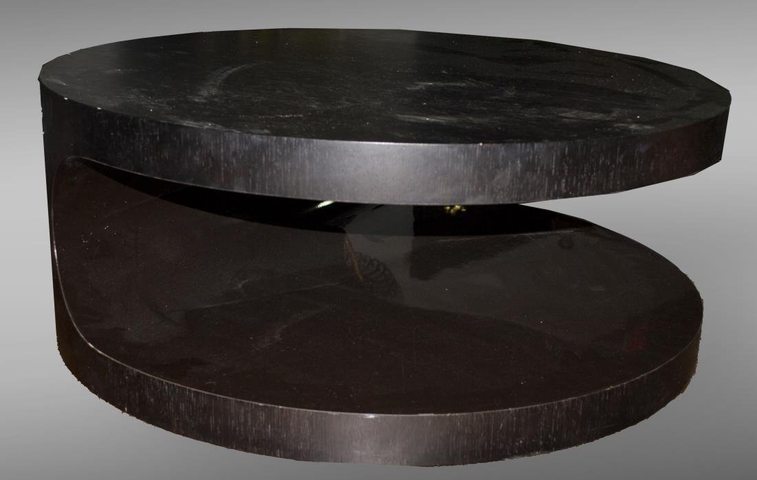 Black Painted Oak Coffee Table: Circular top on conforming base. Height 14 inches, diameter 35 inches.