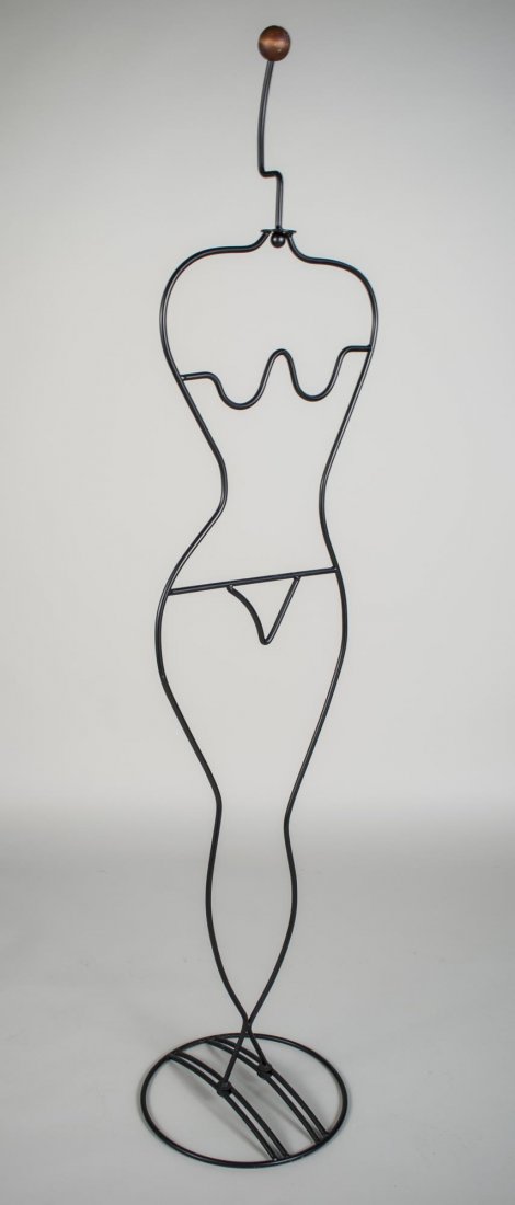 Figural Coat Rack: In the form of a woman. Height 6 feet.