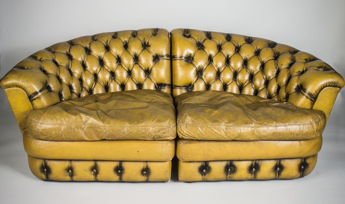 Leather Sectional Sofa: Button tufted backs. Height 29 inches, width combined 6 feet, detph 32 inches.