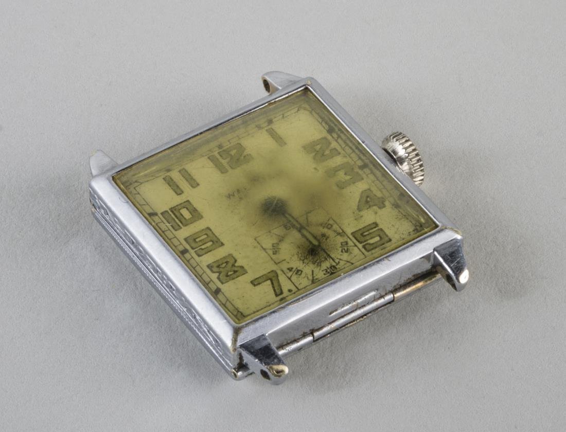 Man's Waltham Gold Watch: 14k white gold watch without band, case engraved, 'To Lou from Ann 12-17-27. 1 x 1 inch.