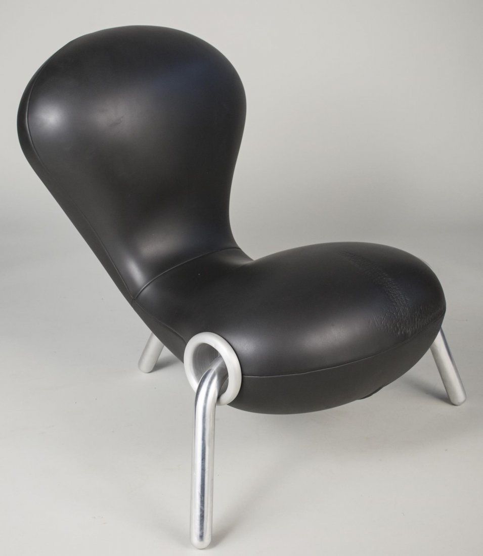 Marc Newson Embryo Lounge Chair: Black neoprene upholstery. Height 31 inches, width 28 inches, depth 32 inches.