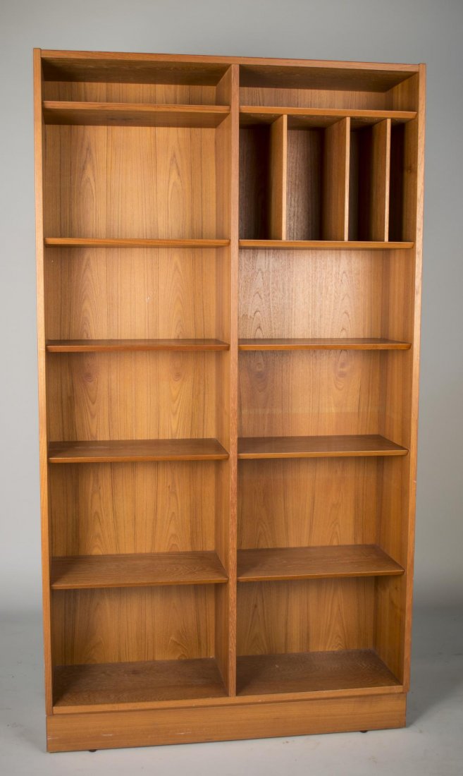 Scandinavian Teak Bookcase: Rectangular top over a bank of open horizontal and vertical shelves. Height 6 feet 5 inches, width 42 1/2 inches, depth 12 inches.