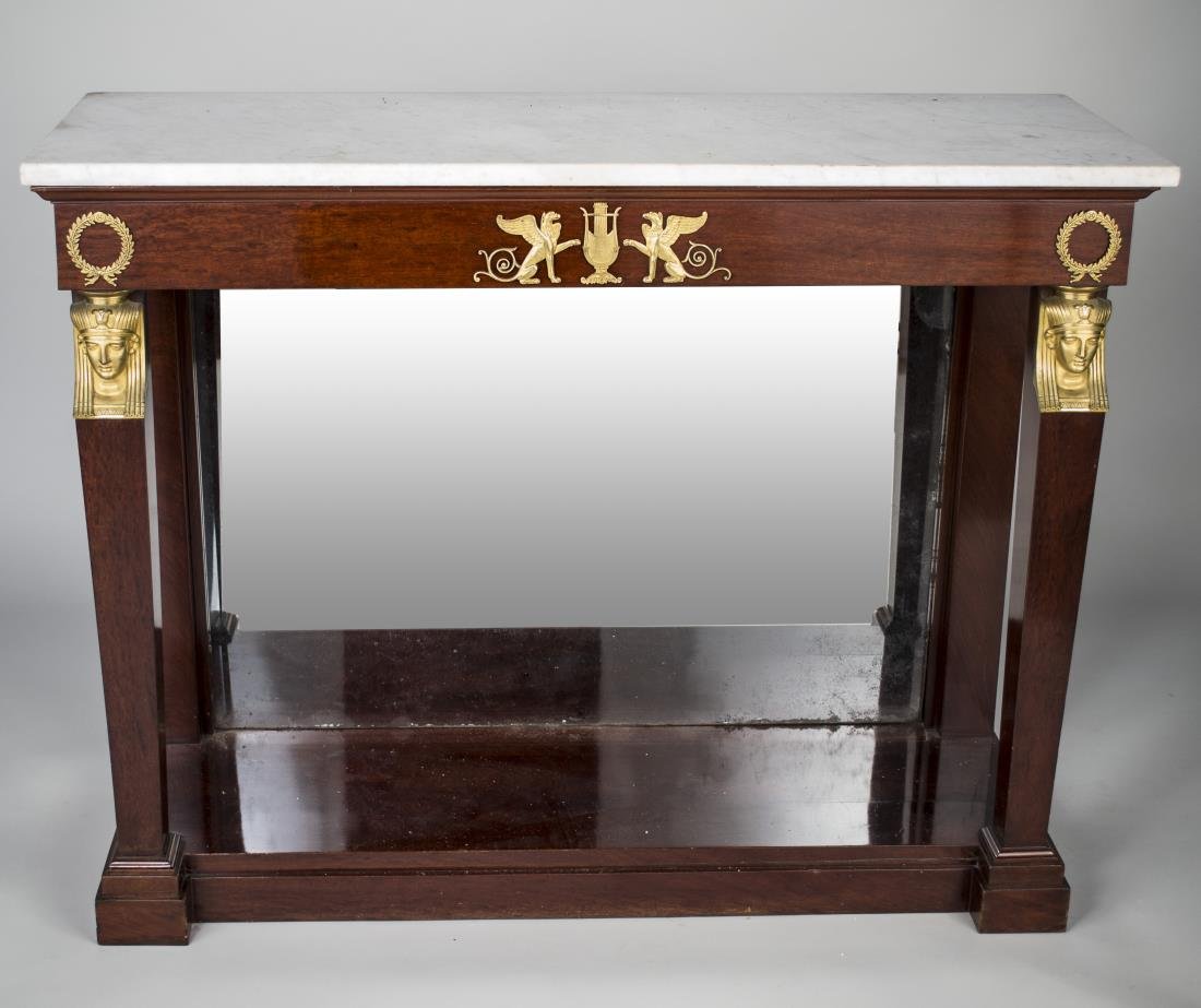 Marble Top Console Table: Gilt mounts and mirrored back. Height 36 inches, width 46 inches, depth 17 1/2 inches
