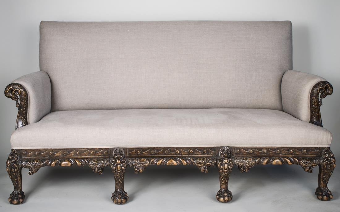 Irish Mahogany Settee: Rectangular top, outscrolled arms, carved apron and cabriole legs. Height 41 inches, width 78 inches, depth 28 inches