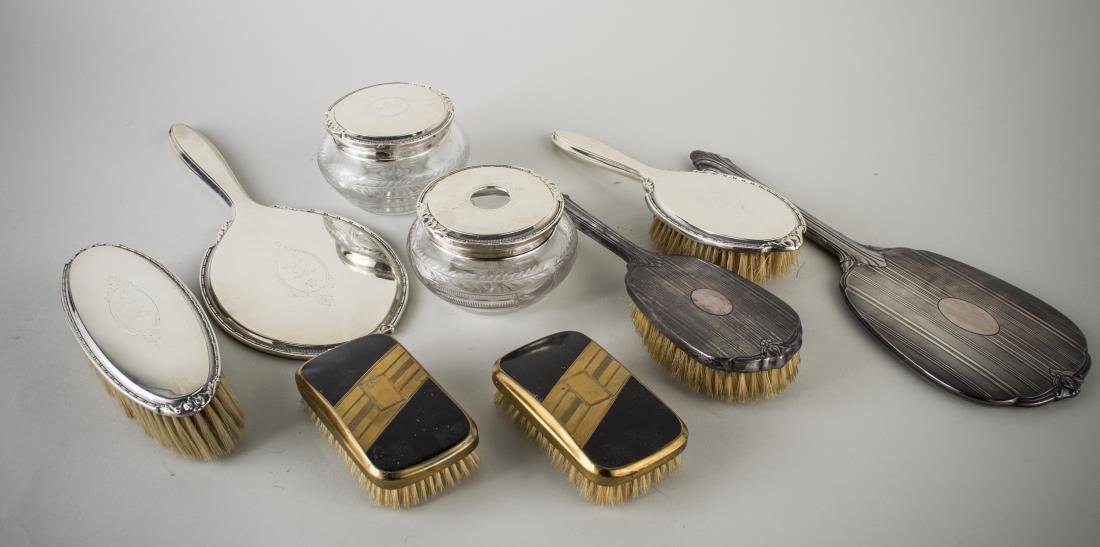 Group of Sterling Silver Dresser Articles: Various makers, including hand mirrors, brushes and two glass jars.