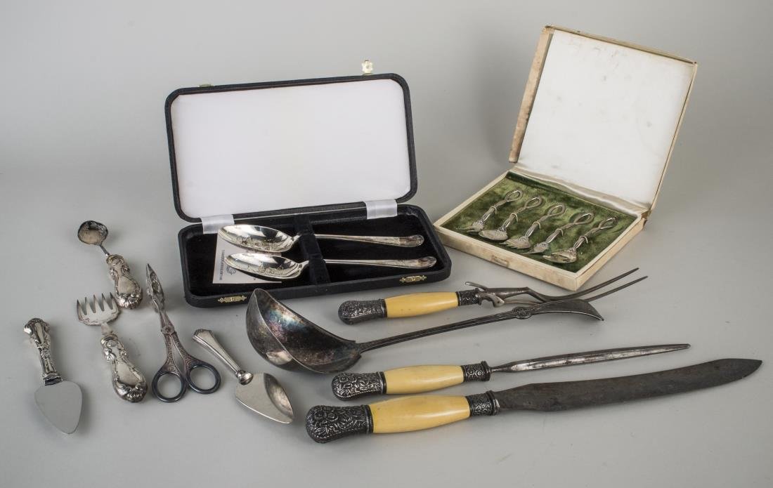 Sterling and Silver Plated Flatware Articles: Including a boxed sterling silver hor d'oeurve serving set, a silver plated three piece carving set with simulated ivory handles, a punch ladle, two sterling handled cheese knives, pastry server, etc.