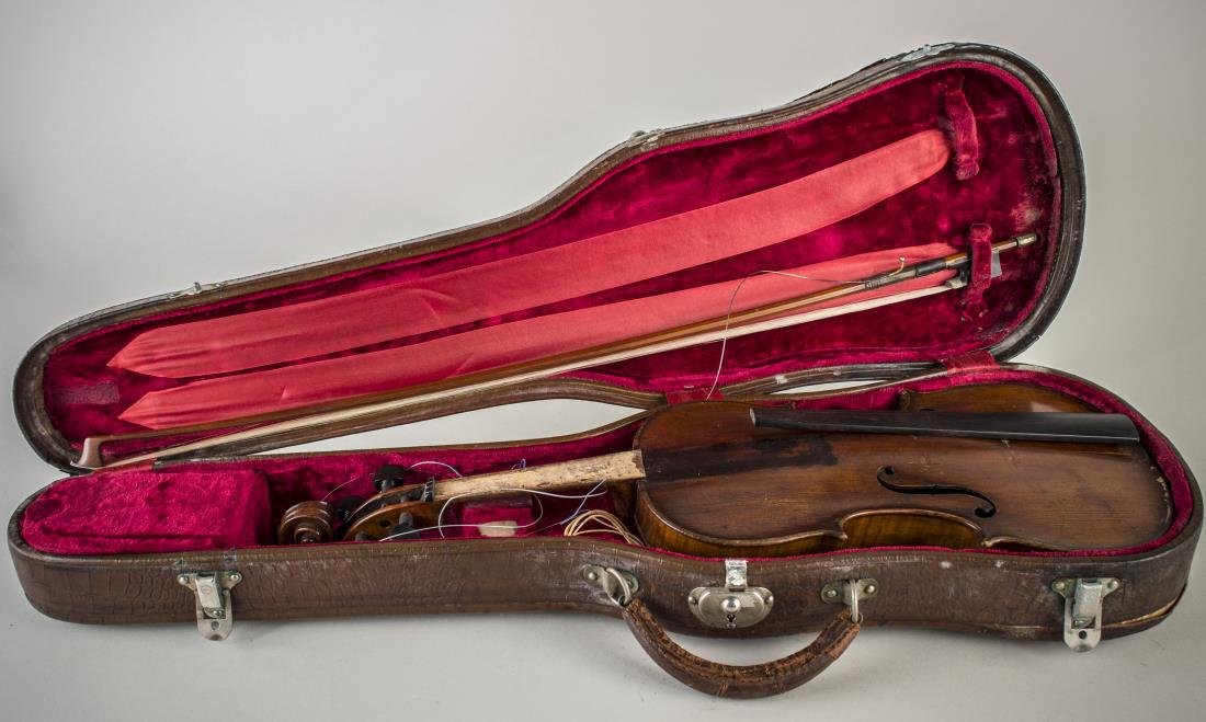 German Violin: With internal label bearing Manufactured in Berlin, a copy of Alessandro Gagliano, and a Gustav Prager bow, with storage case.
