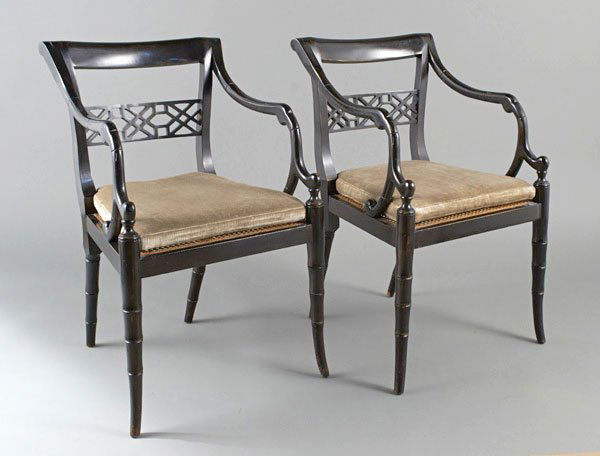 Set of Four Regency Ebonized Armchairs: Each with tablet crest rail, horizontal splat, caned seat with cushion. Height 32 1/2 inches, width 20 inches, depth 20 inches. Provenance: John Rosselli Antiques