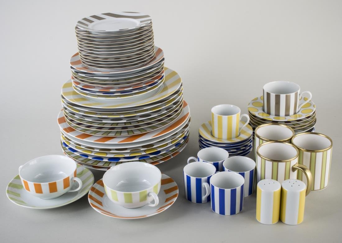 Group of Marc Blackwell Porcelain Dinnerware: Approximately 81 pieces, in three patterns including Dots, Awnings, and Adriatico in various colors, comprising seven chargers, seven dinner plates, seven salad plates, twelve bread plates, two soup c