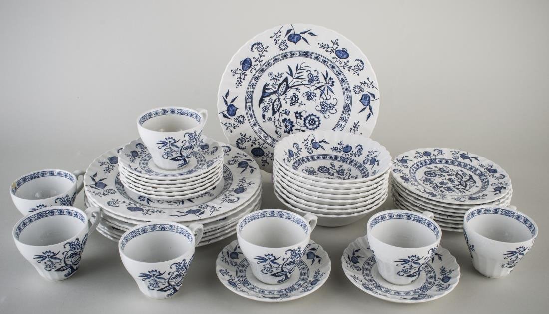 English Meakin Ironstone Dinner Service: Approximately thirty eight pieces, Blue Nordic pattern, comprising seven dinner plates, eight salad plates, eight bowls, seven cups and eight saucers. Dinner plate, diameter 10 inches.