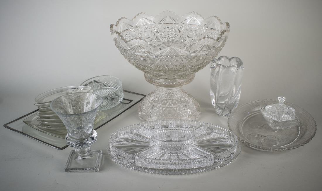 Group of Colorless Glass Table Articles: Including a pedestal punch bowl, divided dish, tray, vase, etc. Tallest height 7 1/4 inches.