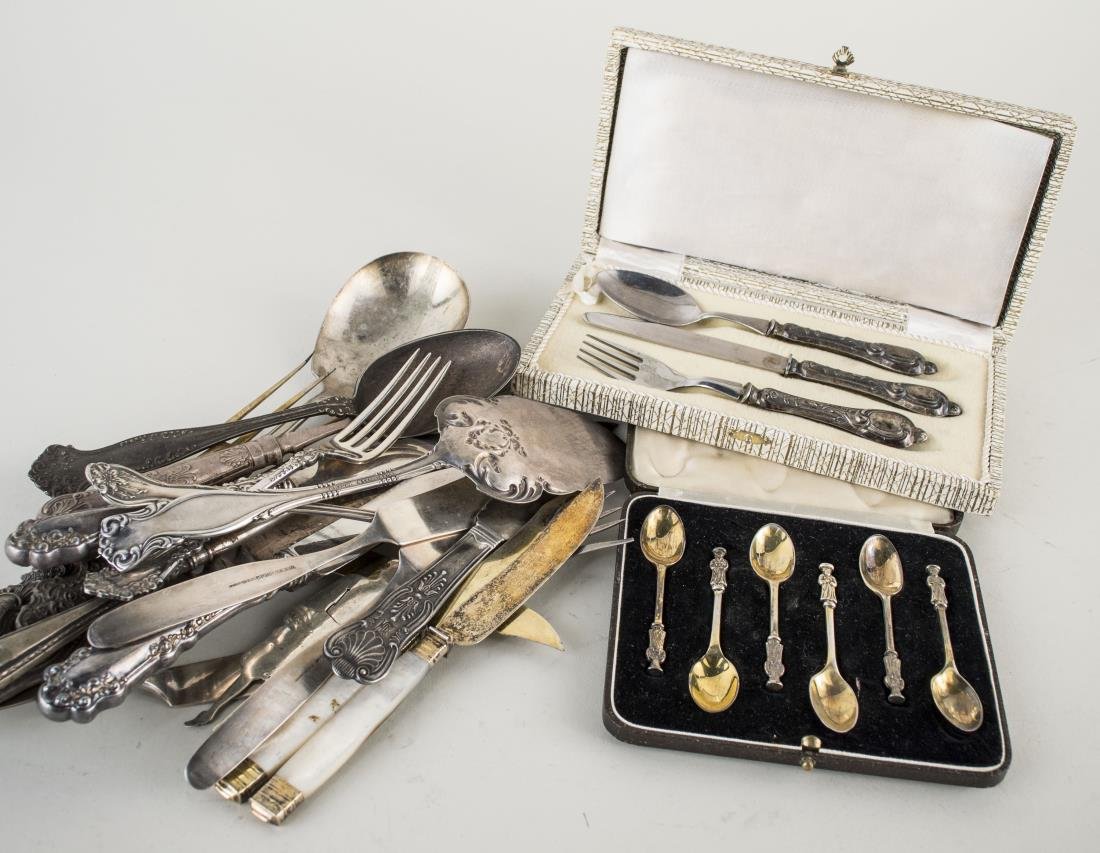 Sterling and Silver Plated Flatware: Two boxed sets and assorted serving flatware, two mother of pearl handled knives, etc.