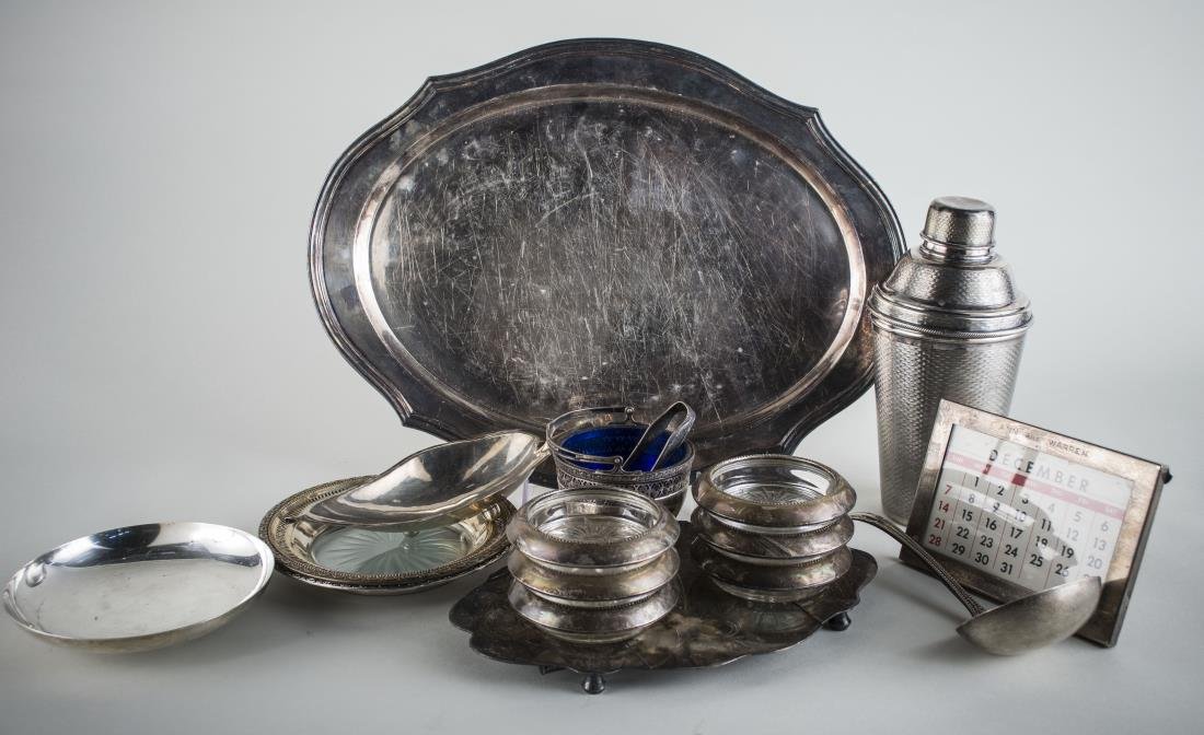 Group of Sterling and Silver Plated Articles: Two sterling silver dishes, punch ladle, coasters, two sterling mounted glass bonbon dishes and a desk calendar, together with a silver plated tray and cocktail shaker, etc.