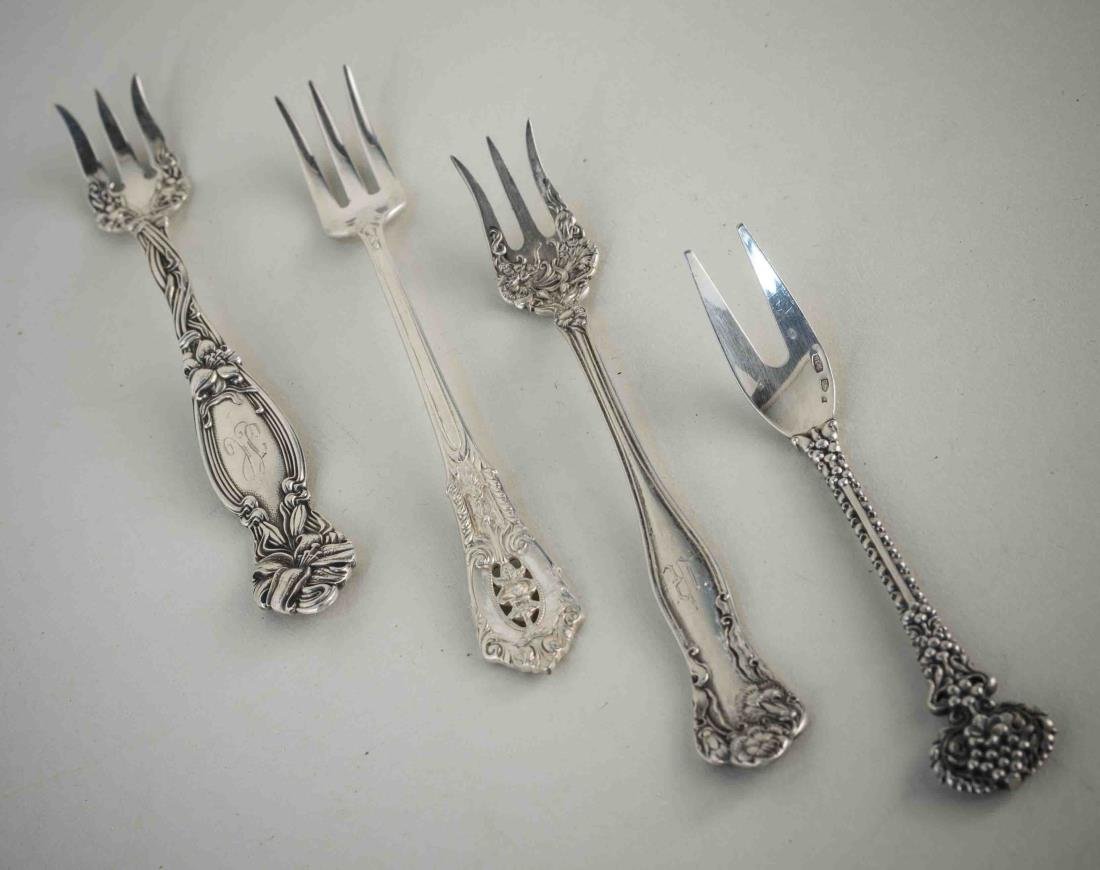 Group of Sterling Silver Hor d'Oeurve Forks: Various makers and patterns. Total 230 grams.