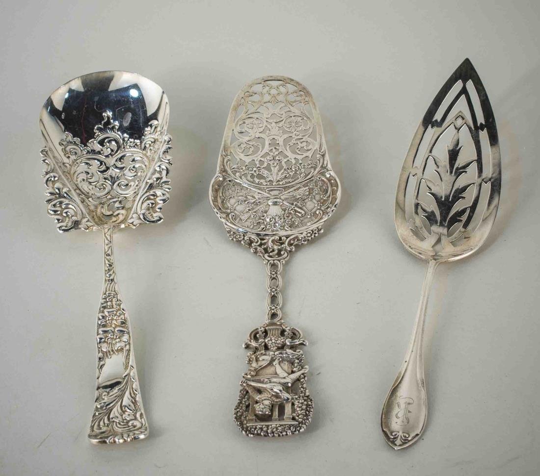 Group of Sterling Silver Flatware Articles: Various makers and patterns, three pierced servers. Total 246 grams.