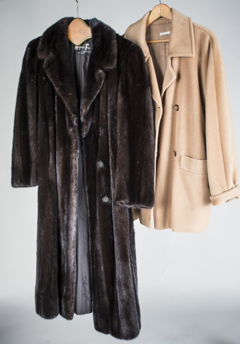 Two Lady's Coats: One a full length fur coat and the other a tan jacket.