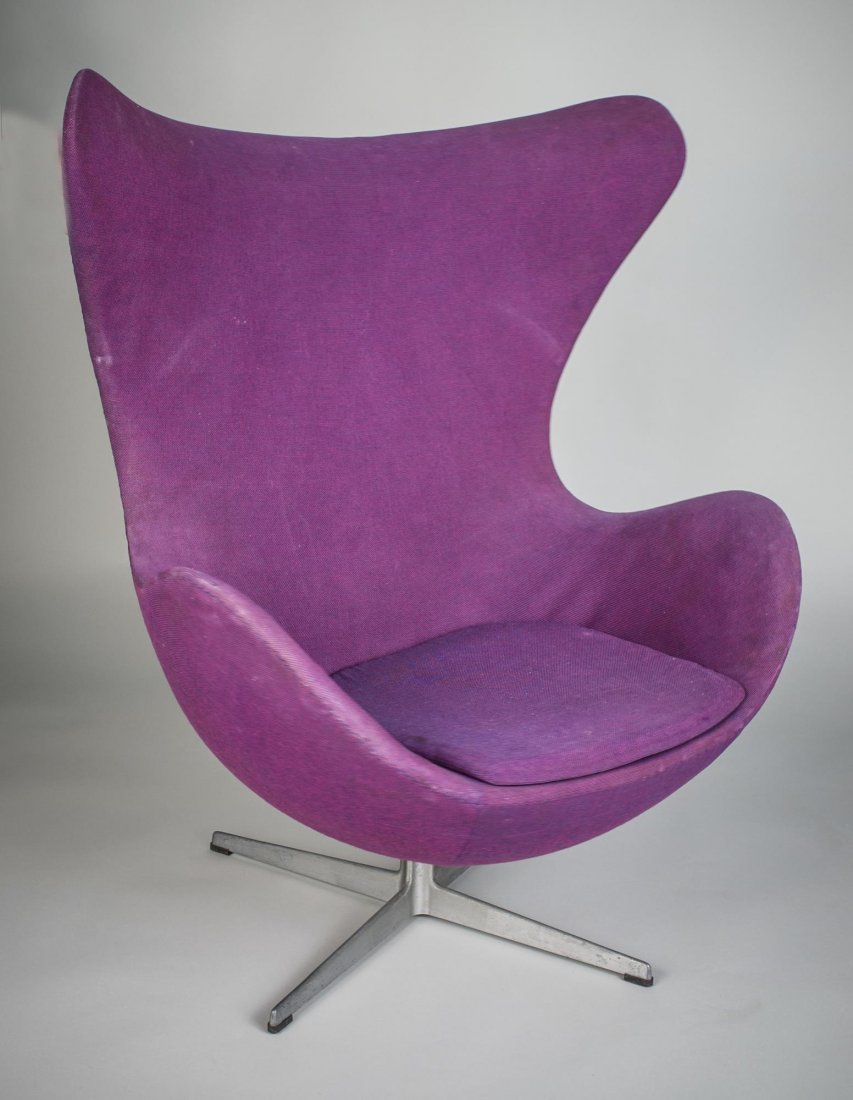 Arne Jacobsen Egg Chair: With original purple fabric upholstery. Designed in 1958 for the lobby and reception areas in the Royal Hotel, in Copenhagen, Fritz Hansen label. Height 42 1/4 inches, width 35 inches, depth 32 inches