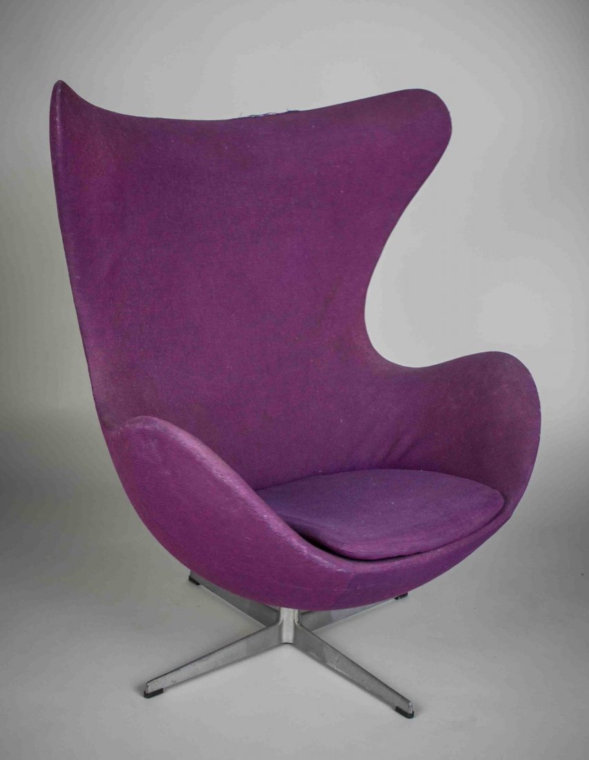 Arne Jacobsen Egg Chair: With original purple upholstery. Designed in 1958 for the lobby and reception areas in the Royal Hotel, in Copenhagen, Fritz Hansen label. Height 42 1/4 inches, width 35 inches, depth 32 inches.