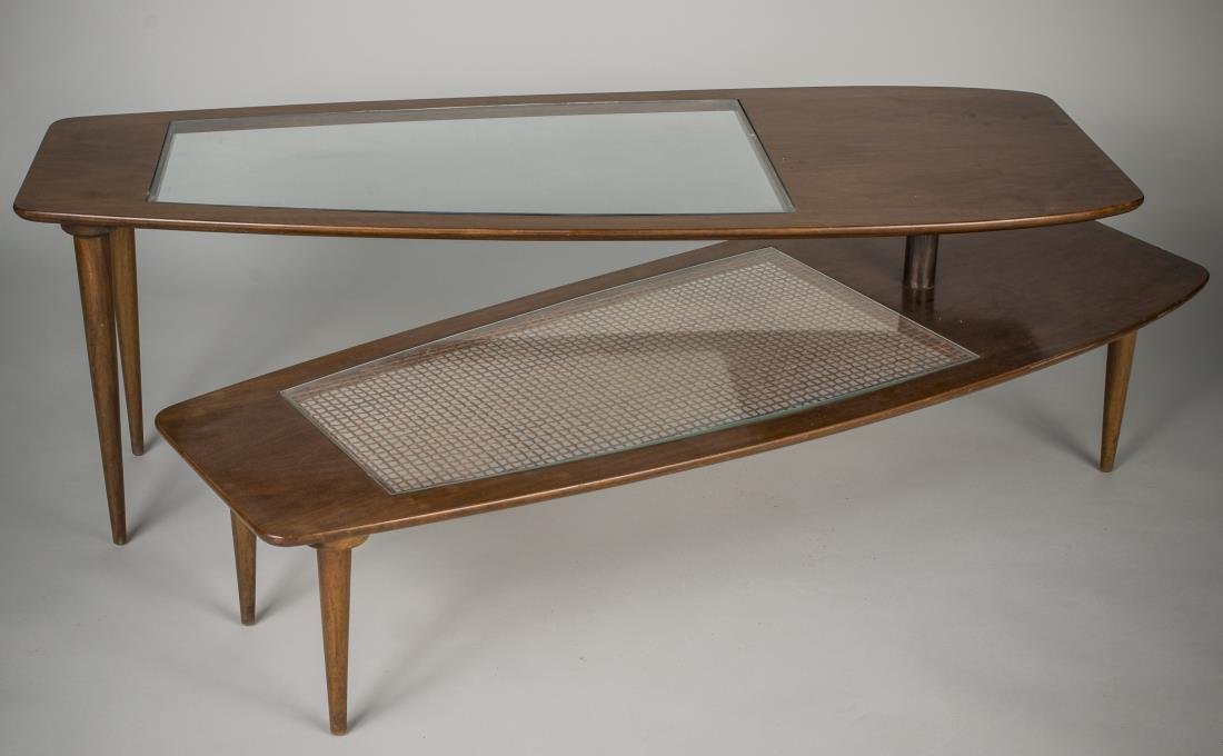 Two Tier Glass and Wood Coffee Table: Shaped rectangular glass inset swivel top on a conforming lower shelf. Height 18 inches, width 55 inches, depth 19 1/2 inches.