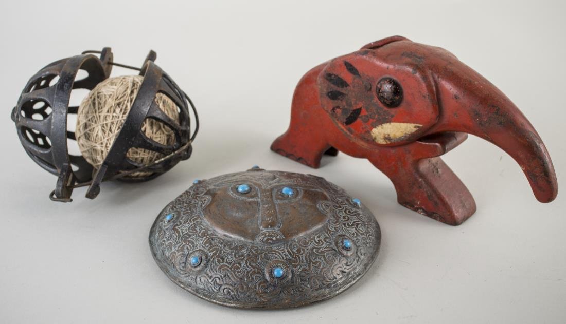 Two Iron Decorations: Elephant form nut cracker and a string ball holder. together with a Middle Eastern wall plaque set with turquoise. Elephant, height 5 inches.