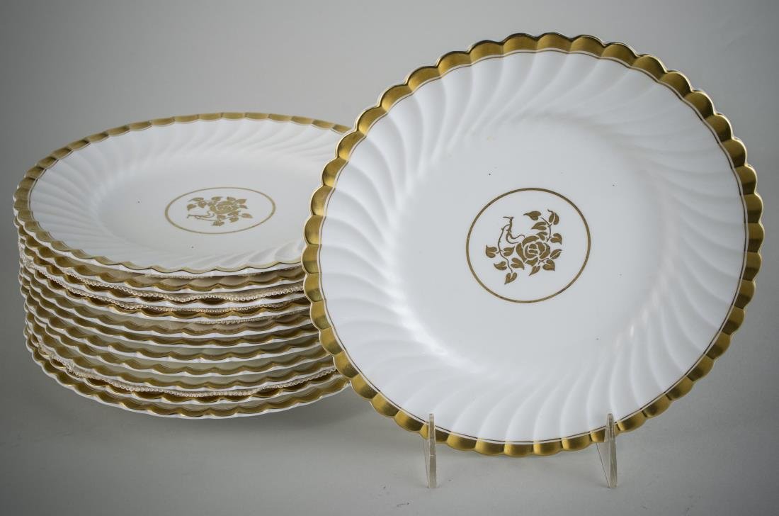Set of Twelve Mintons Porcelain Dessert Plates: Gadrooned border with gilt edge. Diameter 9 inches.
