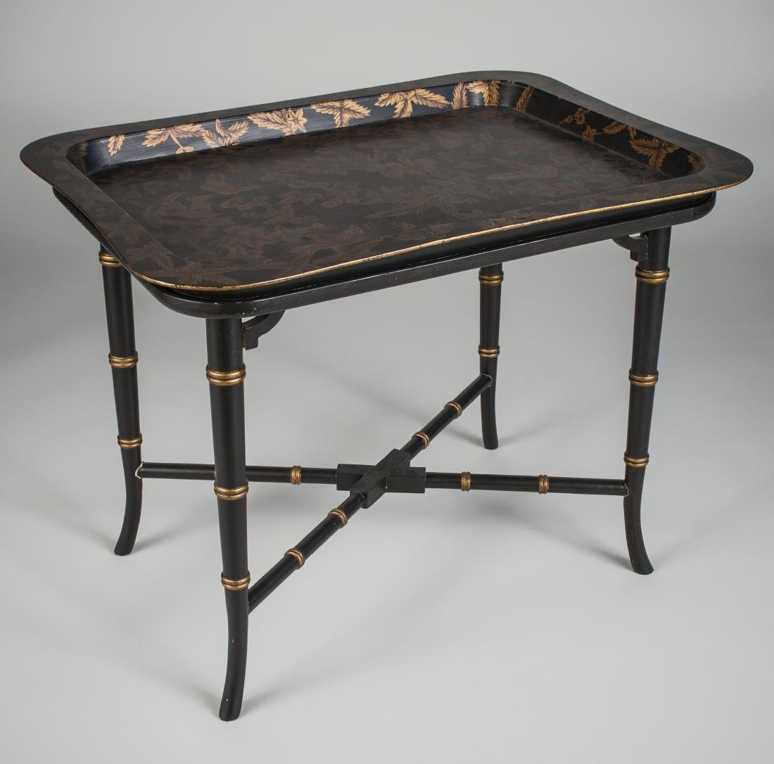 Black Tray Table: Gilt leaf decoration. Height 24 inches, width 30 inches, depth 22 inches.