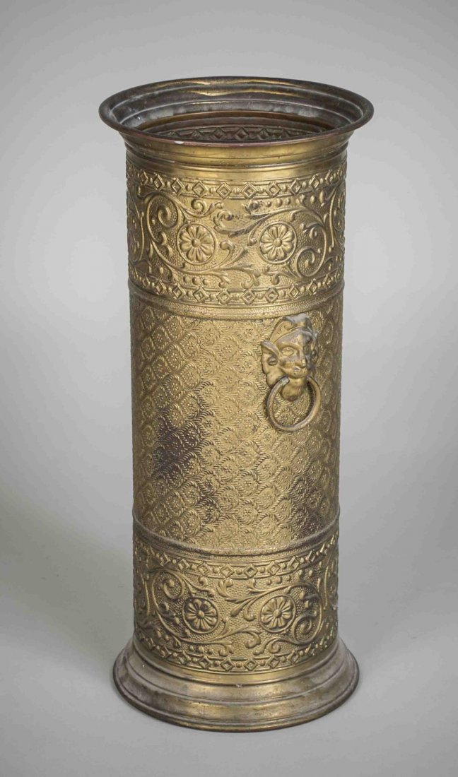 Embossed Brass Umbrella Stand: With ring handles. Height 23 inches, diameter 10 inches.