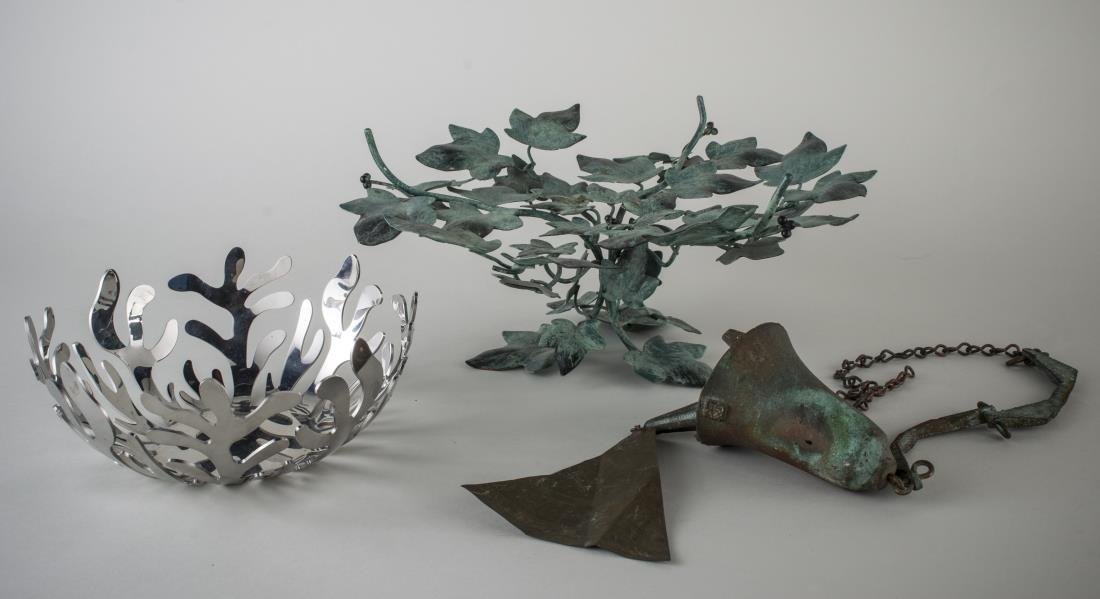 Three Metal Table Decorations: An Alessi stainless steel bowl and a patinated metal ivy compote. Compote, diameter 14 inches, together with a metal hanging bell.