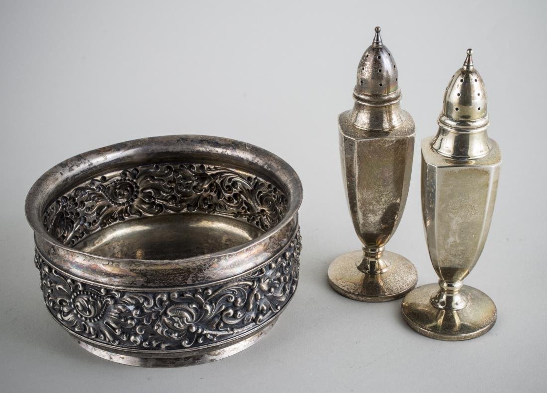 Sterling Silver Wine Coaster & Pair of Shakers: Coaster with repousse floral decoration, Shakers, height 5 1/2 inches, total 270 grams.