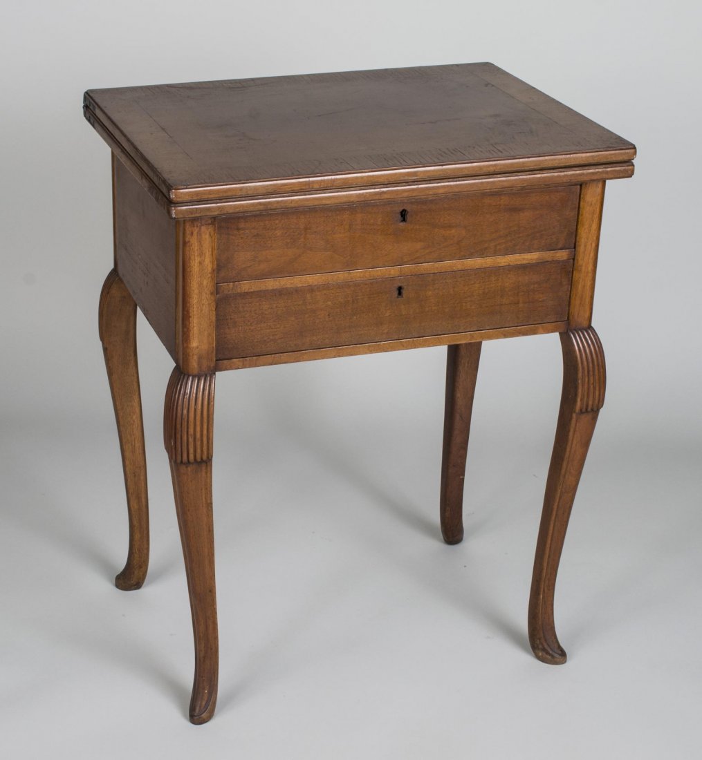 Lift Top Two Drawer Side Table: Rectangular swivel top with rounded corners, over two false drawers, slightly cabriole legs. Height 29, width open 34 inches, depth 24 inches.