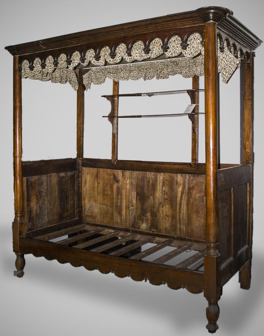 American Chestnut Canopy Day Bed: Arch carved canopy with black and white fabric, matching head and foot boards, with inset two tier decoration. Height 84 inches, width 40 inches.
