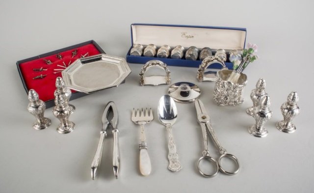 Group of Silver Table Articles: Three napkin rings, set of six .800 silver shakers, boxed set of eight sterling shakers, etc.