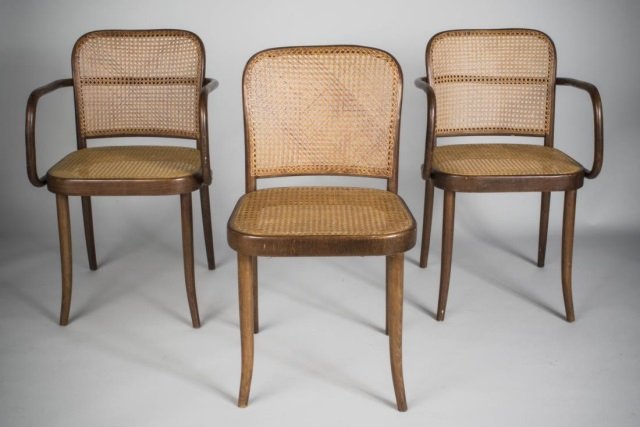 Three Caned Chairs: Comprising a pair of armchairs and a side chair. Arm chair height 32 inches, width 20 inches, depth 20 inches.