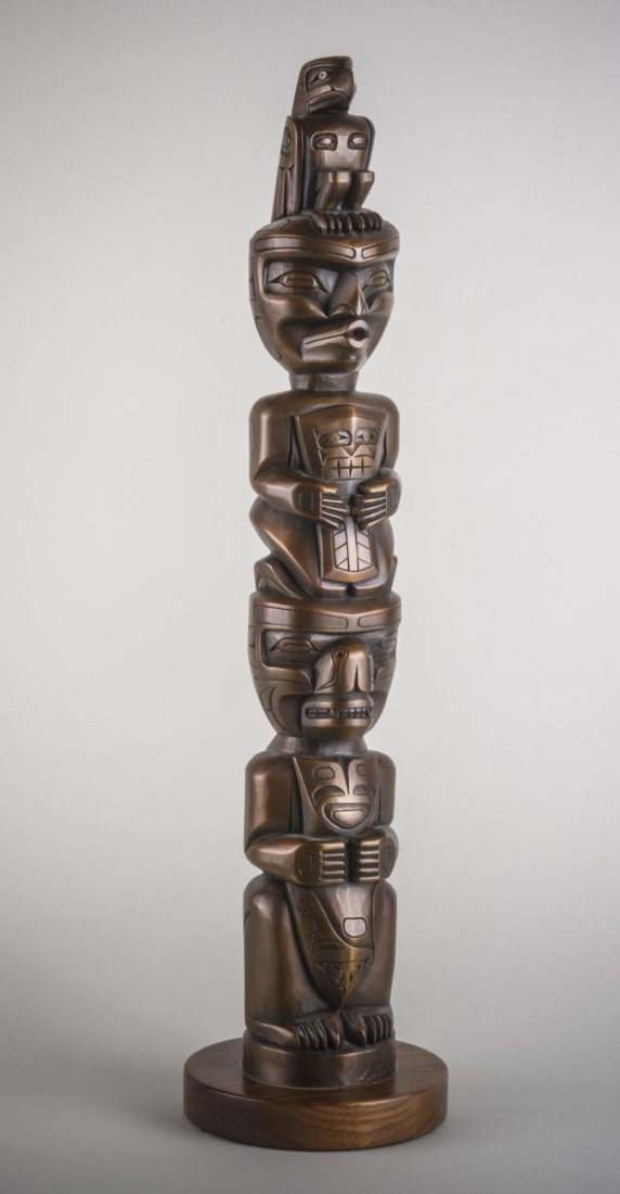 Stanley Hunt (Canadian/Kwakiuth, b. 1954): Eagle, Wild Woman, Seabear Totem Pole. Patinated Bronze. Signed and numbered 13/30 (on plinth). Height 24 inches.