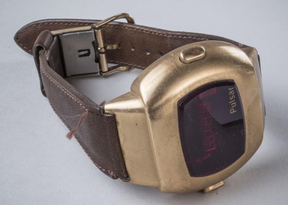 Pulsar Wristwatch: Brown leather band.