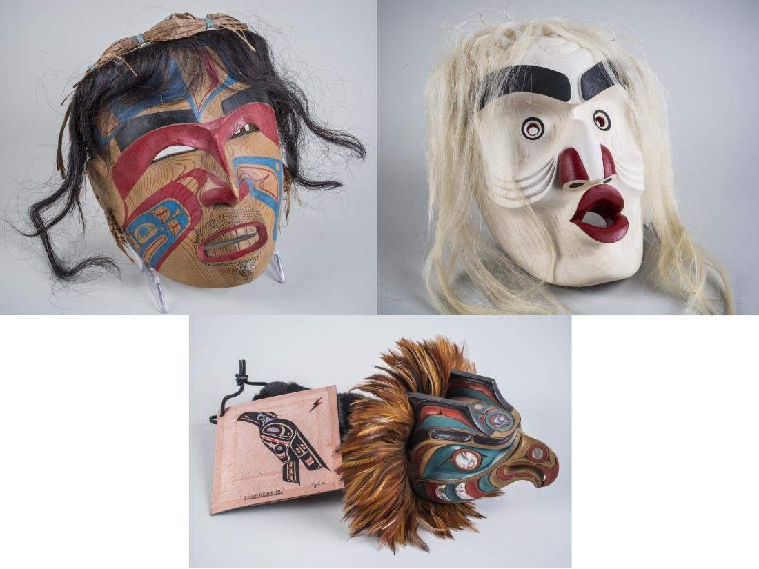 Three Native American Masks: (1) Henry Venn Robinson (Kemano / Kitlope Nation). Wood, paint, hair and hay. Signed (interior). Mask height 10 inches. (2) Stephen Bruce (Kwakwaka’wakw, b. 1968). Wood, paint, and hair, 1991. Signe