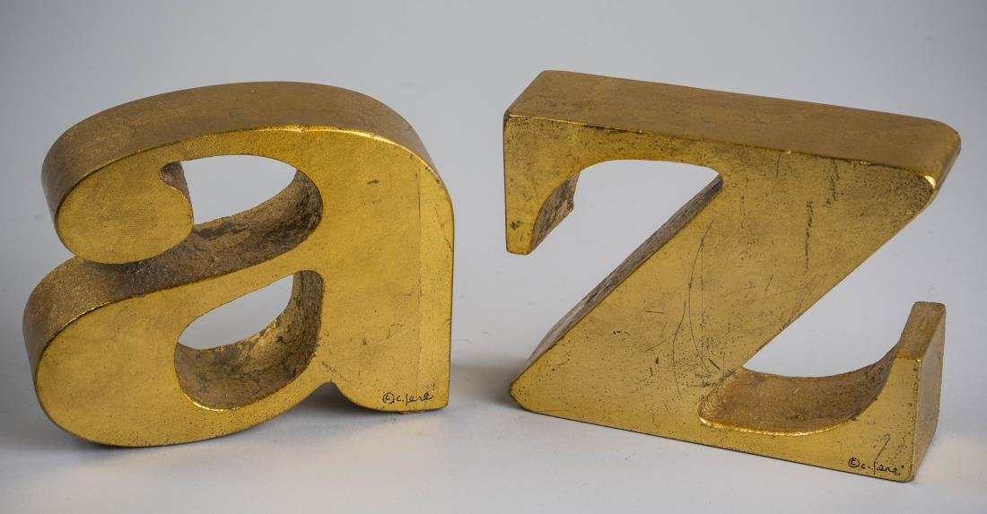 Curtis Jeré A to Z Gilt Iron Bookends: Each signed C. Jere. Height 4 1/2 inches.