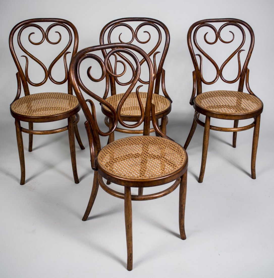 Set of Four Bentwood Side Chairs: Caned seats. Height 35 inches, width 17 inches, depth 15 inches.