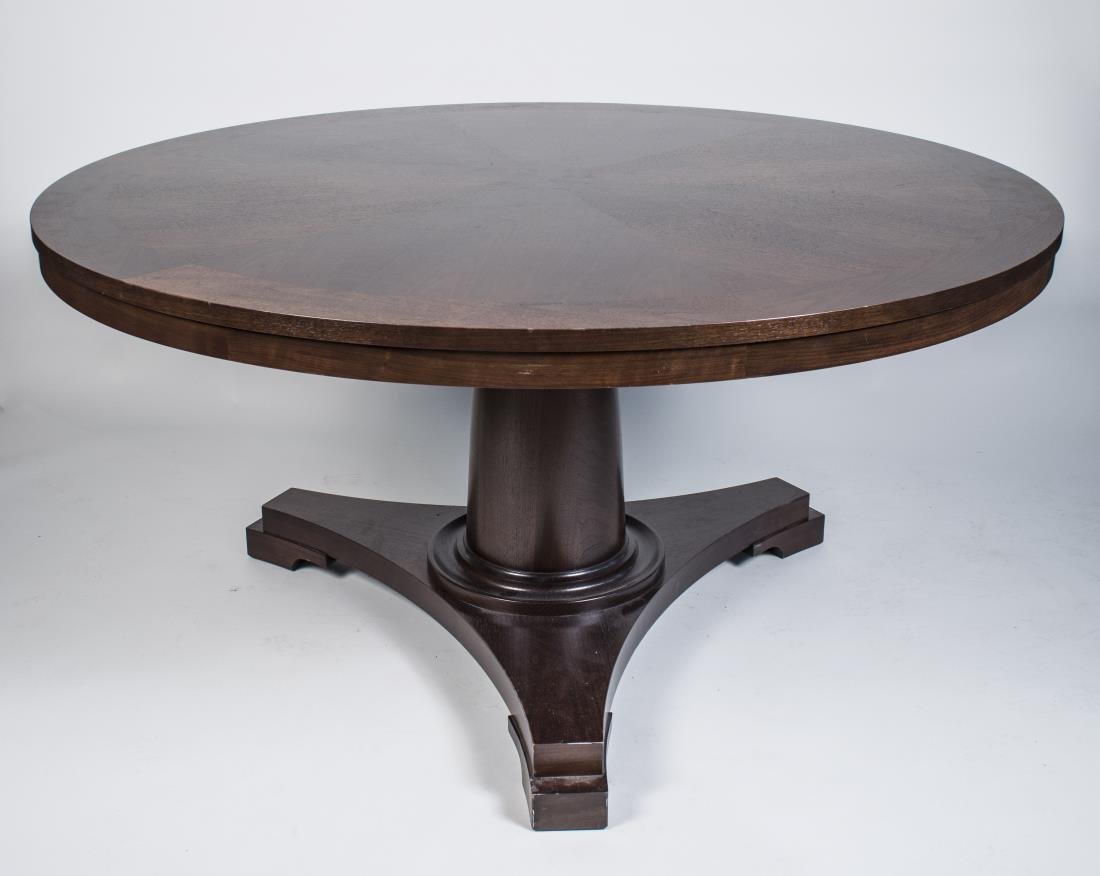 Holly Hunt Dinning Room Table: Circular top on a turned column support a tripartite base. Height 30 inches, top diameter 60 inches.