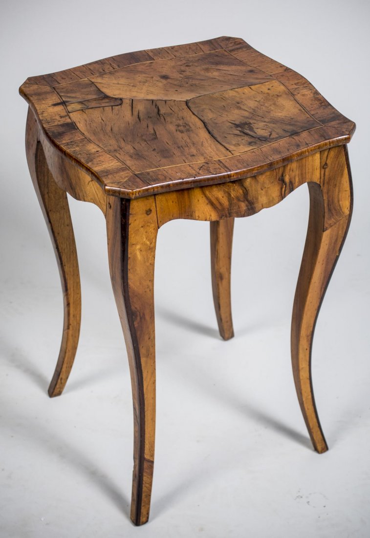 Biedermeier Style Burl Wood Occasional Table: Shaped rectangular top on slightly cabriole legs. Height 20 inches, width 14 inches, depth 14 inches.