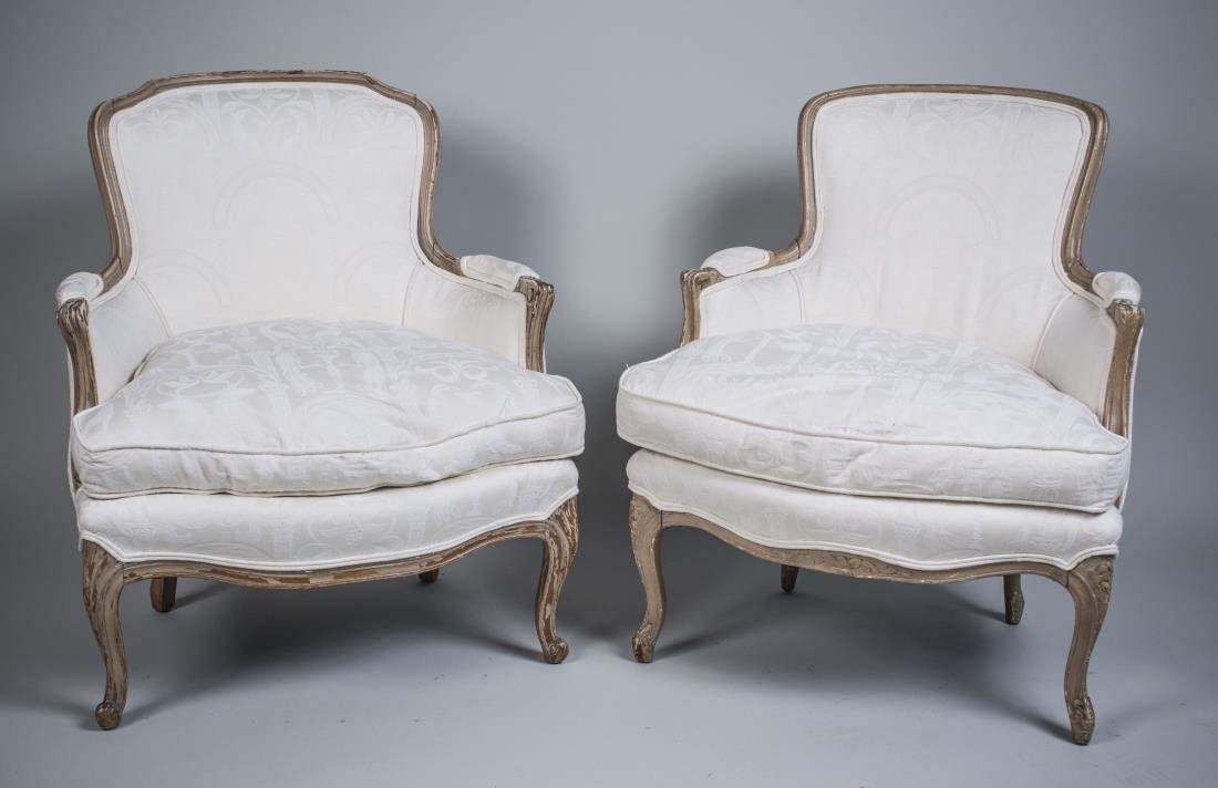 Pair of Louis XV Style Bergeres: Upholstered seats, backs, and arms. Height 35 inches, width 29 inches, depth 29 inches.