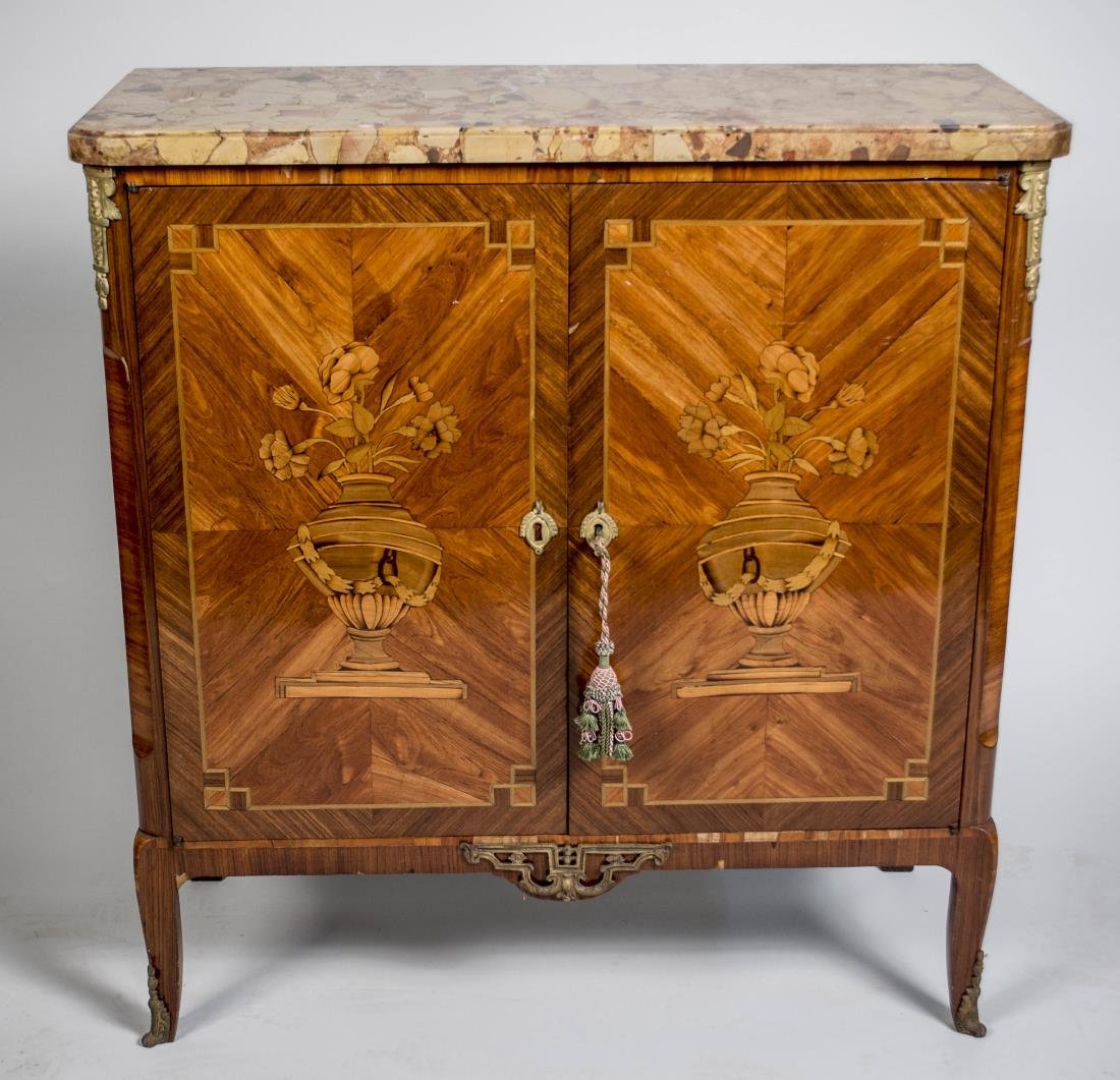 Louis XV / XVI Transitional Style Side Cabinet: Rectangular marble top over a pair of floral filled basket inlaid doors, slightly cabriole legs ending in sabots. Height 39 3/4 inches, width 37 inches, depth 18 inches. Height 38 3/4 inches, width 37